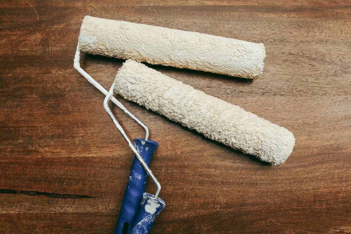 Side-by-side comparison showing heavy duty caulking gun next to worn-out standard model